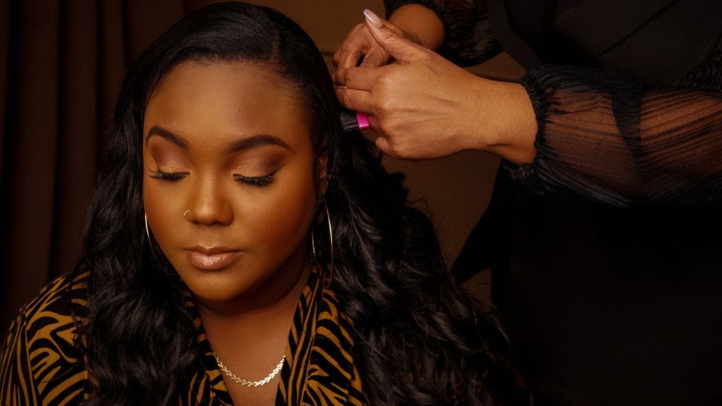 Hair Stylist Is Installing Hair Extensions On The Head Of Other Woman